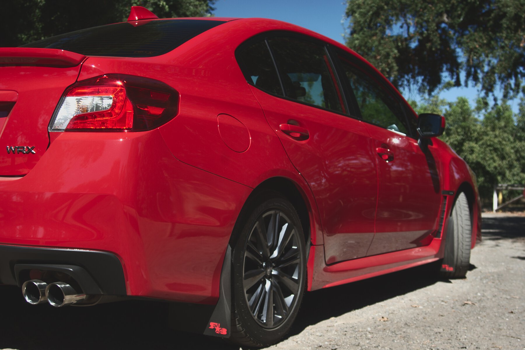 Subaru WRX with rally style mud flaps