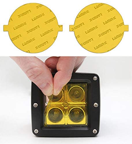 Yellow fog light cover on Subaru WRX