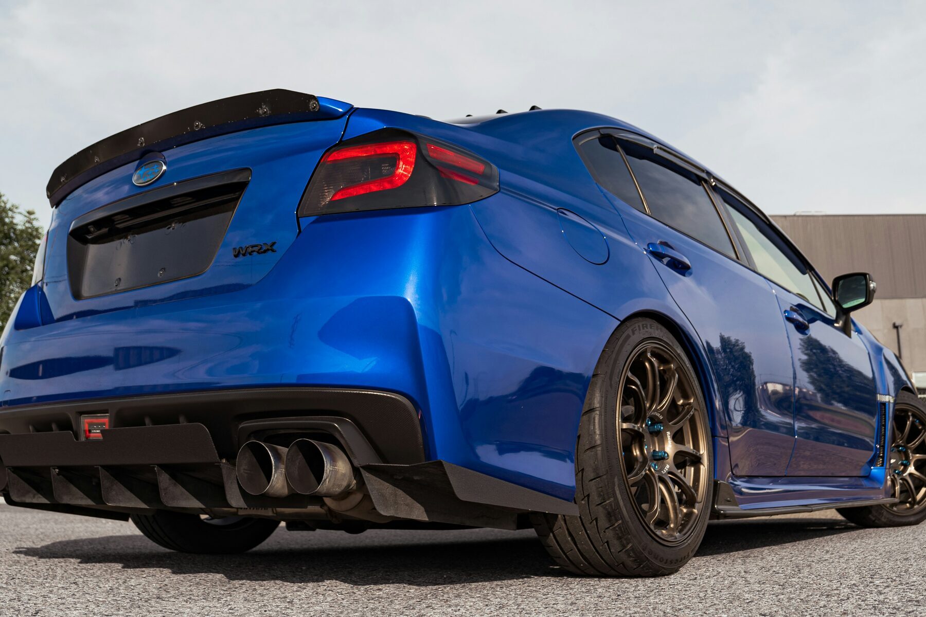 Blue Subaru WRX viewed from the rear