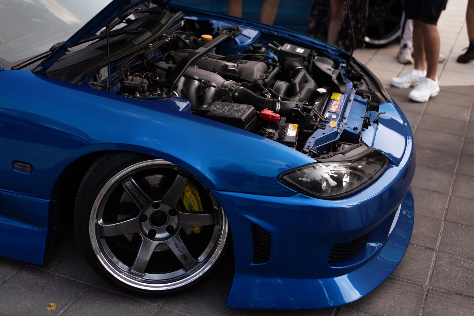 Blue Subaru performance car with exposed turbo engine for WRX tuning