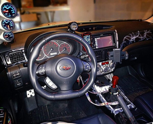 Carbon Fiber Steering Wheel Emblem Overlay installed in a Subaru BRZ
